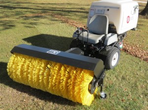 The rotary broom attachment expands the usefulness of the Navigator well beyond the cutting season.